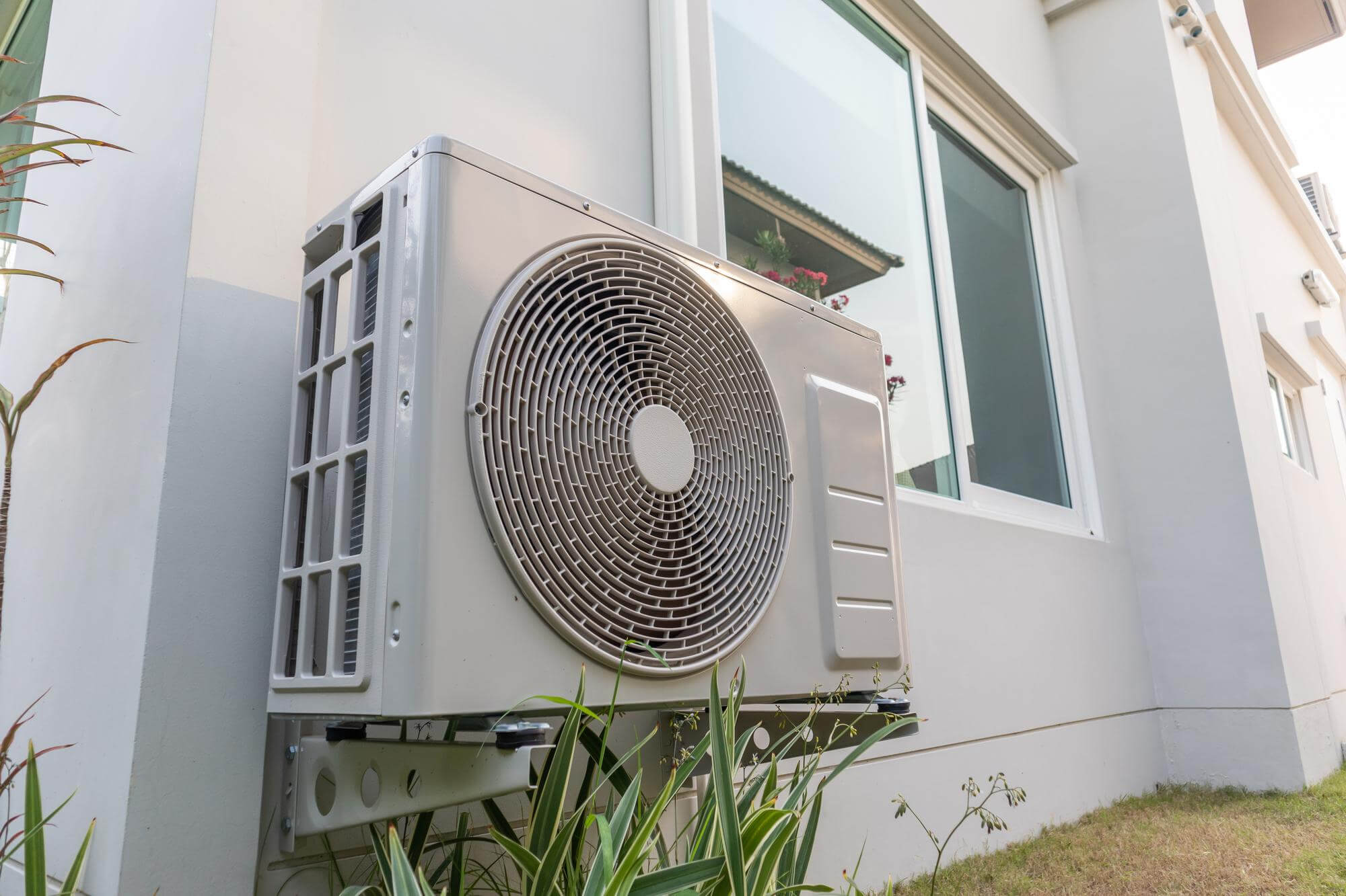 AC repair or replacement blog featured image of a mini-split system.
