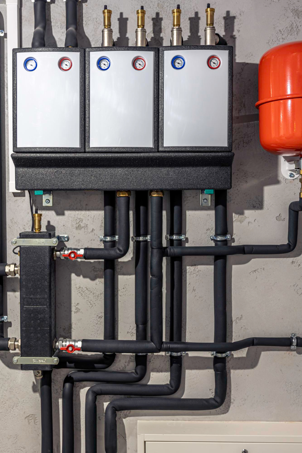 A side-by-side comparison of a boiler and furnace, highlighting efficiency and maintenance needs of heating systems.